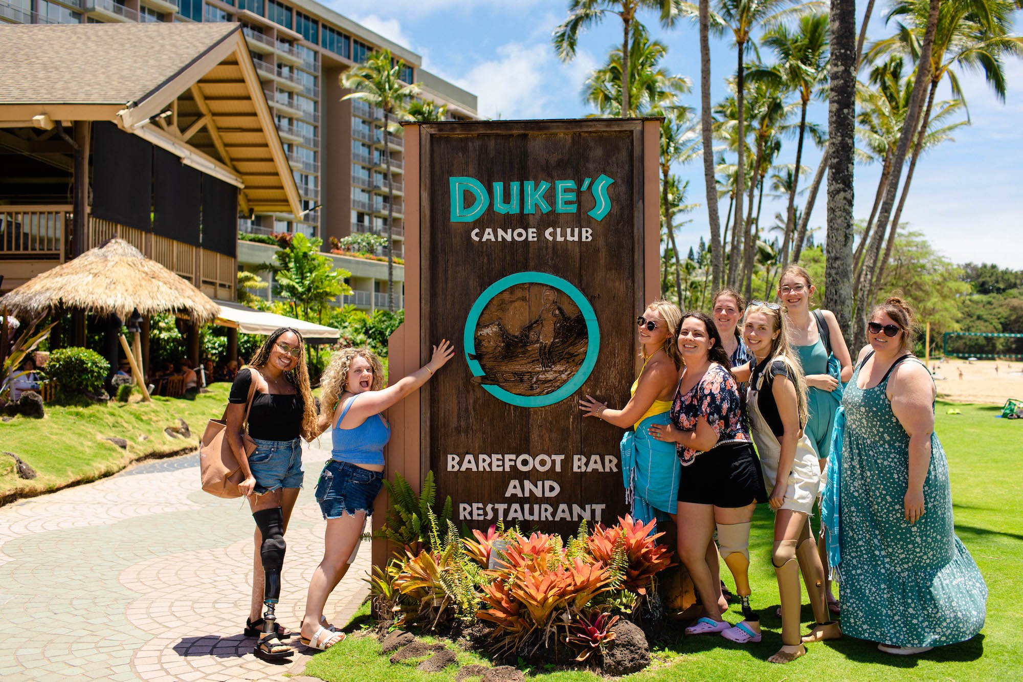 Retreat attendees in front of Duke's Kauai