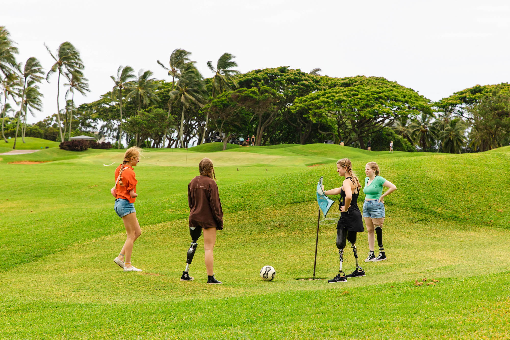 Attendees playing footgolf