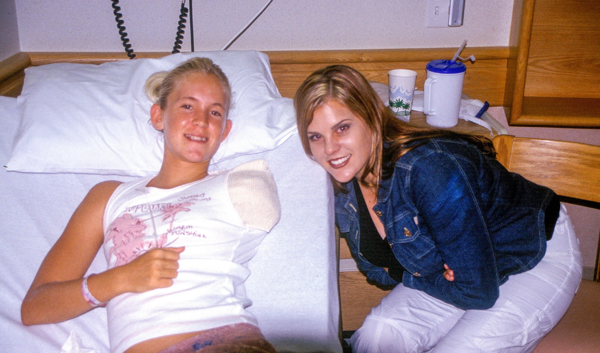 Bethany Hamilton and Sarah Hill, Beautifully Flawed Foundation Executive Director, in the hospital back in 2003 right after Bethany lost her arm in the shark attack.